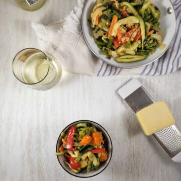 zoodle primavera dinner with white wine and parmesan