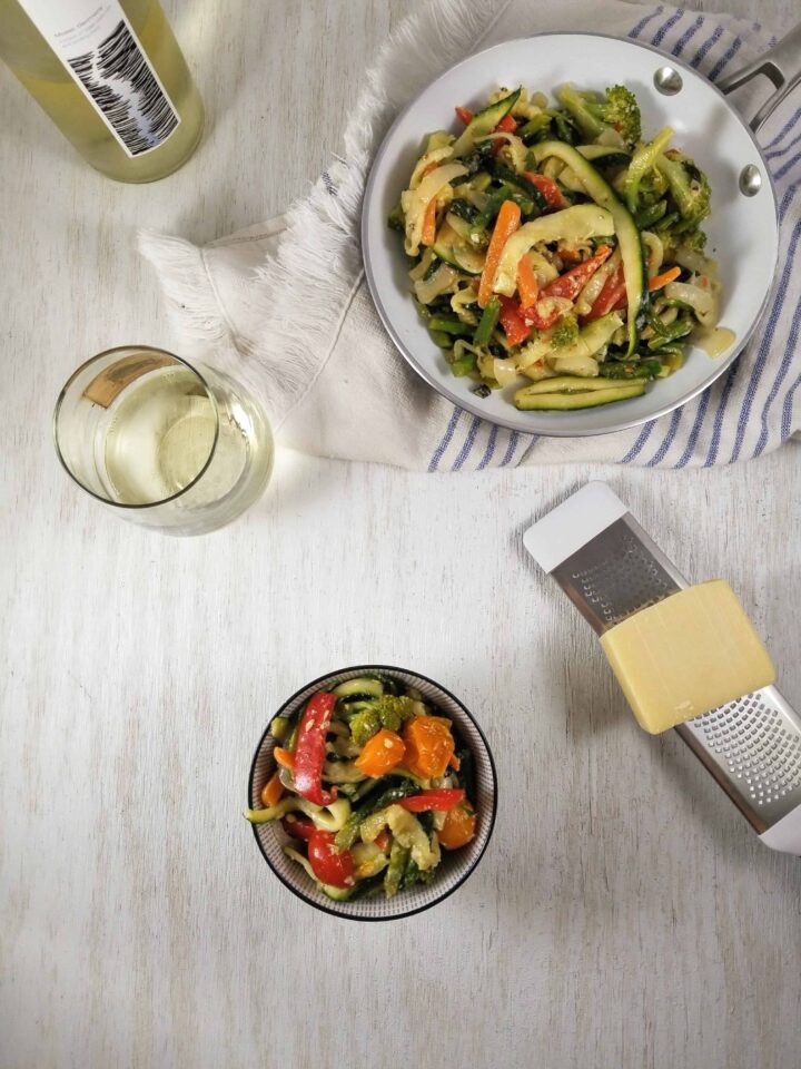 zoodle primavera dinner with white wine and parmesan