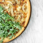Caramelized Onion, Gorgonzola and Pear Pizza with Arugula | Sip and Spice